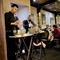 Impastato's Restaurant - They were putting together the pasta course on Christmas Eve near our table