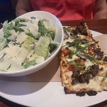 Seasons 52 - Half of Flatbread with a salad, lunch menu item - New American Near Me - Costa Mesa, California Seasons 52 - Half of Flatbread with a salad, lunch menu item - New American Near Me - Costa Mesa, California