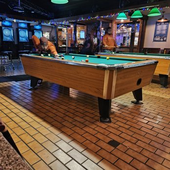 JD Slicks - Sitting at the table looking out at the bar/pool area. - Cocktail Bars Near Me - Sultan, Washington JD Slicks - Sitting at the table looking out at the bar/pool area. - Cocktail Bars Near Me - Sultan, Washington