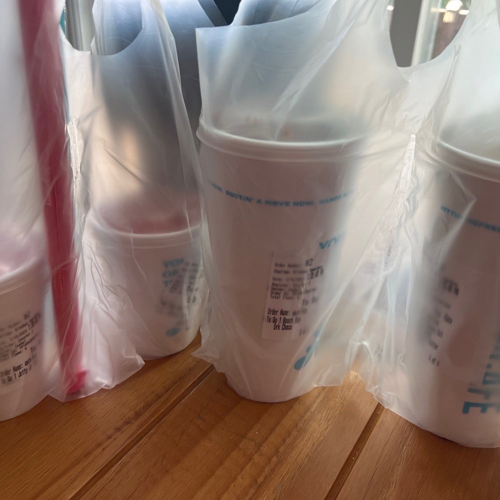 Tropical Smoothie Cafe - To go carriers that legit never spill / edible lime and strawberry straws to sip and eat - Juice Bars & Smoothies Near Me - Highlands Ranch, Colorado
