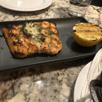 The Manship Wood Fired Kitchen - Lemon flavored grilled salmon - New American Near Me - Jackson, Mississippi The Manship Wood Fired Kitchen - Lemon flavored grilled salmon - New American Near Me - Jackson, Mississippi