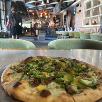 Moku Kitchen - Pizza size is good for sharing - Cocktail Bars Near Me - Honolulu, Hawaii