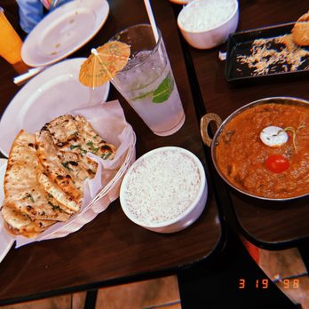 Mr Dosa - Goat curry with rice and a side of garlic naan 10/10. Garlic naan is to die for! - Indian Near Me - Elk Grove, California Mr Dosa - Goat curry with rice and a side of garlic naan 10/10. Garlic naan is to die for! - Indian Near Me - Elk Grove, California