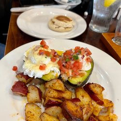 Famous Toastery Carolina Forest - Avocado Benedict Breakfast with a side of English muffin