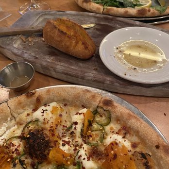 Raduno - Seasonal pizza with local veggies, house bread and anchovy olive oil. Along with our friends pizza that they loved. - Pizza Near Me - Little Rock, Arkansas