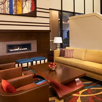 Charleston Marriott Town Center - Gather by the fireplace to take advantage of the social atmosphere. - Hotels Near Me - Charleston, West Virginia Charleston Marriott Town Center - Gather by the fireplace to take advantage of the social atmosphere. - Hotels Near Me - Charleston, West Virginia