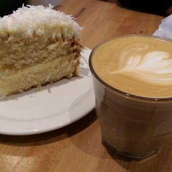 Purebread - Coconut buttermilk cake and latte - Bakeries Near Me - Vancouver, British Columbia Purebread - Coconut buttermilk cake and latte - Bakeries Near Me - Vancouver, British Columbia