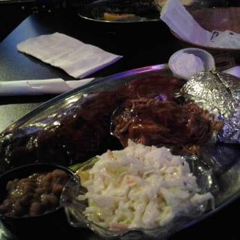 Dukes Rib House & Grille - The Pork Sampler Platter: A half-rack of ribs, a pork chop, a baked potato, pulled pork, cole slaw, and baked beans. - Barbeque Near Me - Pittsburgh, Pennsylvania Dukes Rib House & Grille - The Pork Sampler Platter: A half-rack of ribs, a pork chop, a baked potato, pulled pork, cole slaw, and baked beans. - Barbeque Near Me - Pittsburgh, Pennsylvania