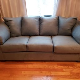 Love my new (sky blue) sofa! The lighting makes it look darker than it really is.