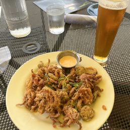 Calamari and green canon ball beer Calamari and green canon ball beer