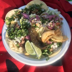Antojitos Del Sureste - Taco plate overview, plus lil peek of the salsa cup. Very hot and flavorful salsa!
