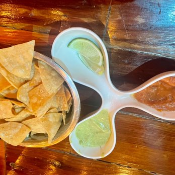 La Panga De Mejj - Freshly made chips with salsa. The green sauce is my favorite but it's extra spicy. The red one is not spicy. - Mexican Near Me - Houston, Texas La Panga De Mejj - Freshly made chips with salsa. The green sauce is my favorite but it's extra spicy. The red one is not spicy. - Mexican Near Me - Houston, Texas