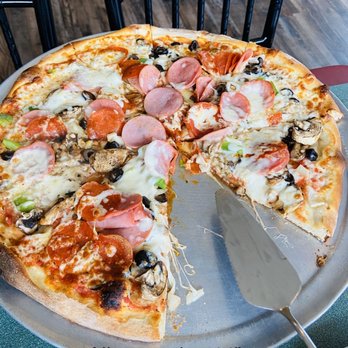 Napoli's Pizza & Restaurant | East Plano, TX - Nine-topping pizza 14" - Pizza Near Me - Plano, Texas