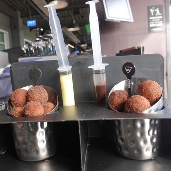 Topgolf - cinnamon sugar donut holes with Bavarian cream & chocolate - $14 - nice that $1 is donated to Make-A-Wish (see menu) - Golf Near Me - San Jose, California Topgolf - cinnamon sugar donut holes with Bavarian cream & chocolate - $14 - nice that $1 is donated to Make-A-Wish (see menu) - Golf Near Me - San Jose, California