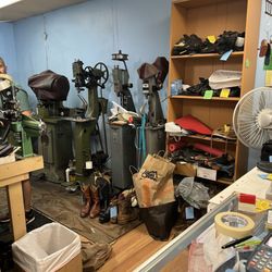 Champion Shoe Repair - His junky, disorganized store.