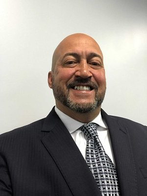 AKG Roofing and Specialty Services Logo