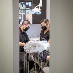 Brandon W Lee, DDS - Friends And Family Dental - Dr. Lee and Yuri hard at work