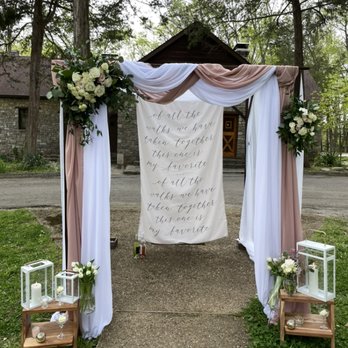 Blue fish Event Rentals - Dark wood chuppah beautifully decorated at the Cedars Forrest Lodge - Party Equipment Rentals Near Me Blue fish Event Rentals - Dark wood chuppah beautifully decorated at the Cedars Forrest Lodge - Party Equipment Rentals Near Me