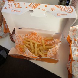 A small portion of disgusting stale fries Not Cajun Fries