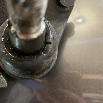 Firestone Complete Auto Care - This is the lower ball joint passenger Side you can see the mark from the flat head! - Auto Repair Near Me - Lake in the Hills, Illinois Firestone Complete Auto Care - This is the lower ball joint passenger Side you can see the mark from the flat head! - Auto Repair Near Me - Lake in the Hills, Illinois
