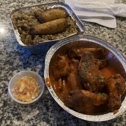 Neighborhood Kitchen - NK Wings plate with djon djon rice
