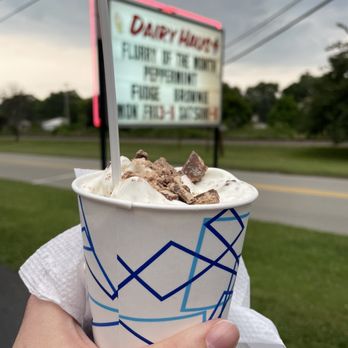 Dairy Haus - a hand holding a cup of ice cream - Ice Cream & Frozen Yogurt Near Me - Scottdale, Pennsylvania Dairy Haus - a hand holding a cup of ice cream - Ice Cream & Frozen Yogurt Near Me - Scottdale, Pennsylvania