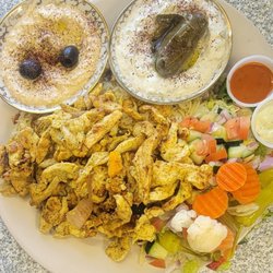 Rosemary - Homemade orange chicken shawarma. It's made with real orange. It comes with hummus taziki dolma salad and rice.