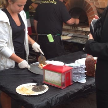 Tuscan Wood Fired Pizza Catering - Making some pizza at the June rodeo - Caterers Near Me Tuscan Wood Fired Pizza Catering - Making some pizza at the June rodeo - Caterers Near Me