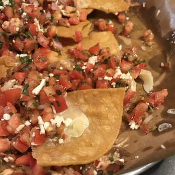 Tacofino - The chips for the nachos were fried and made them sturdy to eat with the rest of the plate. - Mexican Near Me - Vancouver, British Columbia