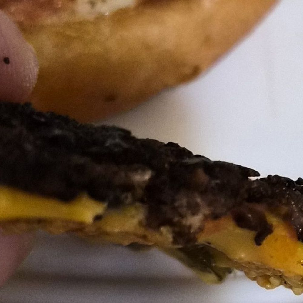 Jack Astor's - Paper thin burger meat and burnt black. What the hell! This went in to the garbage. - Sports Bars Near Me - London, Ontario Jack Astor's - Paper thin burger meat and burnt black. What the hell! This went in to the garbage. - Sports Bars Near Me - London, Ontario