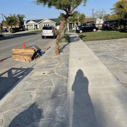 the shadow of a person on a sidewalk the shadow of a person on a sidewalk