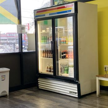 Delphine Jamaican Restaurant - Drinks refrigerator - Caribbean Near Me - Warren, Michigan Delphine Jamaican Restaurant - Drinks refrigerator - Caribbean Near Me - Warren, Michigan