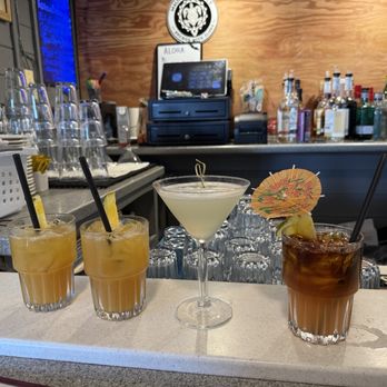 Brennecke's Beach Broiler - Fruit punch for kids which they loved, and my mai tai on the right. - Seafood Near Me - Koloa, Hawaii