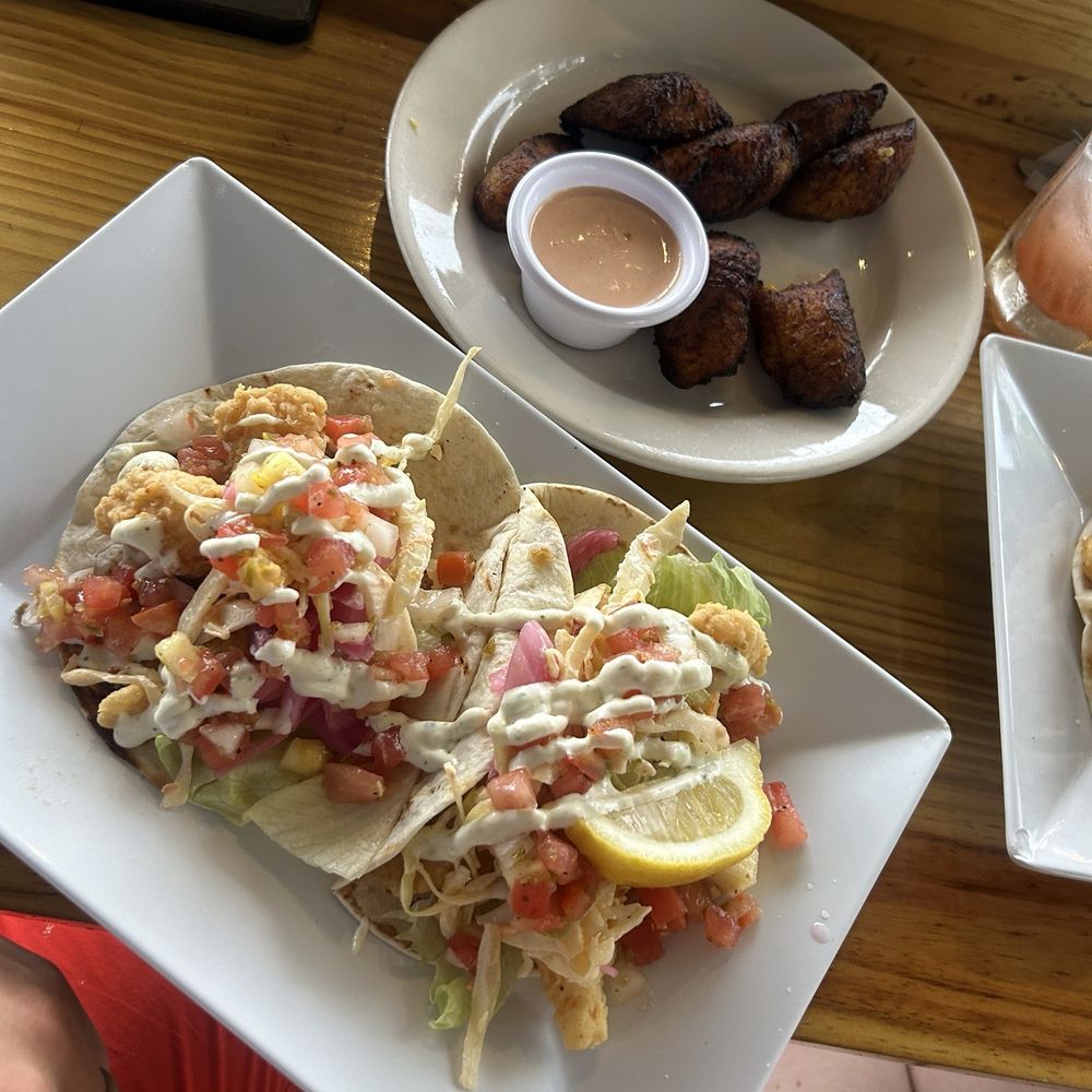 Fried fish tacos and sweet plantains