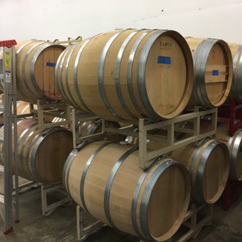 Sightglass Cellars - barrels stacked on a rack - Wine Tasting Room Near Me - Woodinville, Washington Sightglass Cellars - barrels stacked on a rack - Wine Tasting Room Near Me - Woodinville, Washington