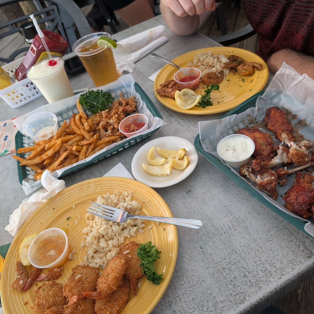 Squid Lips - Coconut shrimp platter fried clam strips the bourbon barbecue wings. Land shark draft pina colada and the rum runner absolutely great. - Seafood Near Me - Cocoa Beach, Florida Squid Lips - Coconut shrimp platter fried clam strips the bourbon barbecue wings. Land shark draft pina colada and the rum runner absolutely great. - Seafood Near Me - Cocoa Beach, Florida