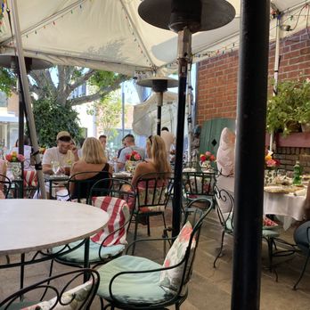 The Ivy - Stone patio, brick walls, picket fences. The Ivy makes you feel as if you are at home by your garden. - New American Near Me - Los Angeles, California The Ivy - Stone patio, brick walls, picket fences. The Ivy makes you feel as if you are at home by your garden. - New American Near Me - Los Angeles, California