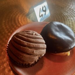 Chocolate concha muffin and Boston cream filled donut Chocolate concha muffin and Boston cream filled donut