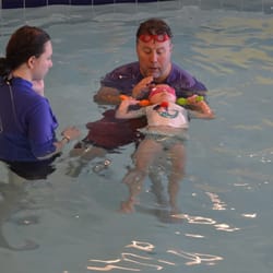 Triangle Swim School - Raleigh - Coach Matt training a new instructor. We have a highly trained staff.