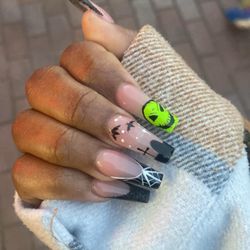 Tina's Nails & Spas - The Nightmare Before Christmas inspired nails. Done by Kenny