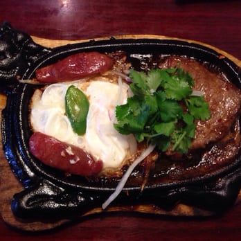 Huynh Restaurant - Steak and eggs with Chinese sausage $6.25. Only served on weekends - Vietnamese Near Me - Houston, Texas Huynh Restaurant - Steak and eggs with Chinese sausage $6.25. Only served on weekends - Vietnamese Near Me - Houston, Texas