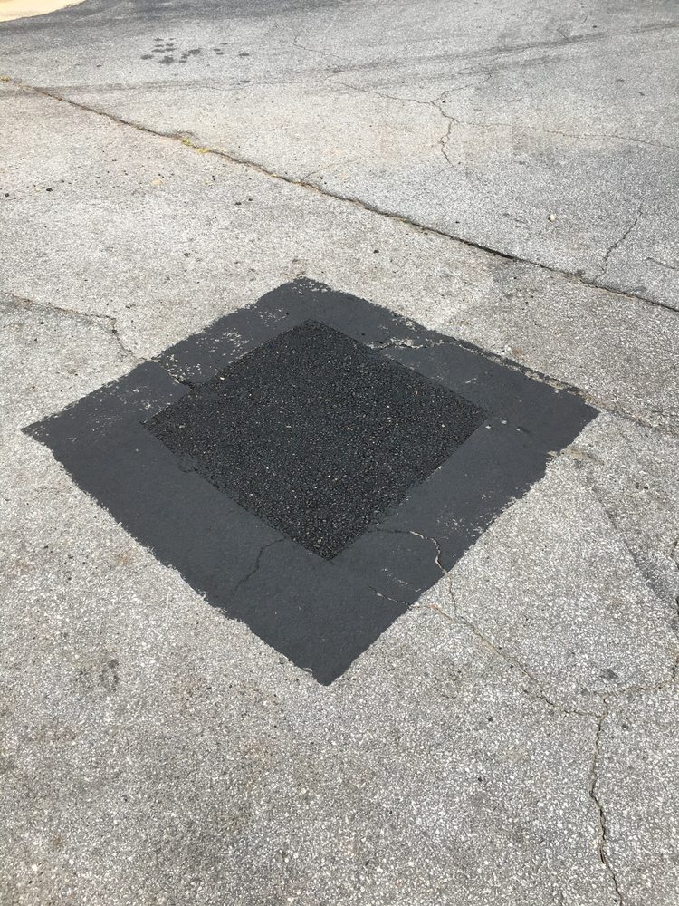 Slide of A1 Seal Coating and Roofing