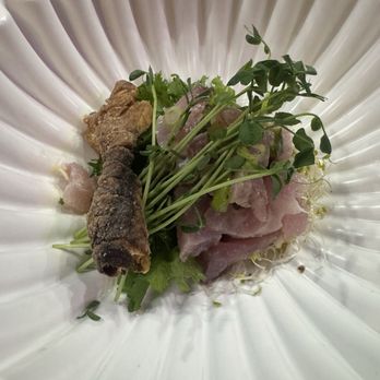 Sushi Table - Using the fried fish skin to enhance the dish. - Japanese Near Me - San Luis Obispo, California Sushi Table - Using the fried fish skin to enhance the dish. - Japanese Near Me - San Luis Obispo, California