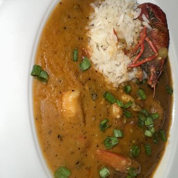 Voodoo Bayou - Shrimp and crawfish etouffee - Cocktail Bars Near Me - Orlando, Florida Voodoo Bayou - Shrimp and crawfish etouffee - Cocktail Bars Near Me - Orlando, Florida