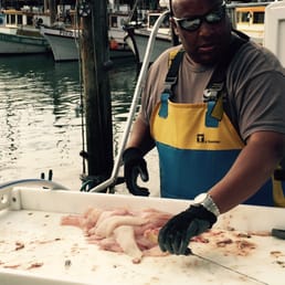 Captain Don cleaning 3 dozen fish. Captain Don cleaning 3 dozen fish.