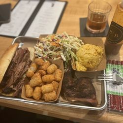 Butcher Block Social - Chicken, corn beef sandwich with side Mac and Cheese, ta toe tots and quarter chicken leg.
