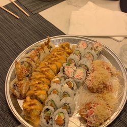 Taizzi Sushi - Memorial - From left to right: Banzai, Golden Cali, California rolls (top), Philadelphia rolls (bottom), Crispy Crab.