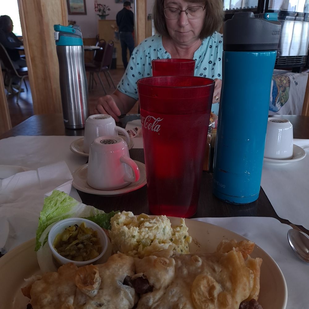 Mutton on fry bread and potato salad Mutton on fry bread and potato salad