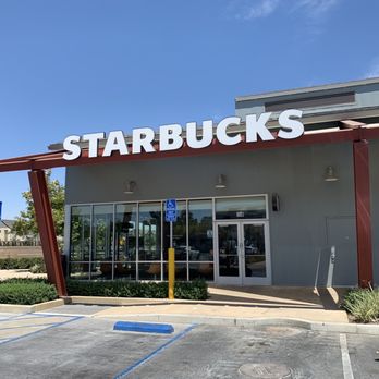 Starbucks - a starbucks sign on the front of a starbucks - Coffee & Tea Near Me - Ontario, California Starbucks - a starbucks sign on the front of a starbucks - Coffee & Tea Near Me - Ontario, California