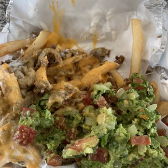 Lala's Cafe - Carne asada fries (looks wonky due to car ride but still 10/10) - Mexican Near Me - Indianapolis, Indiana